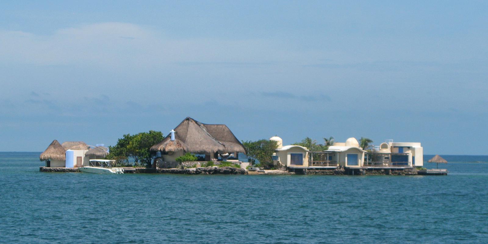 Rosario Islands, Colombia: The Complete Guide to Islas del Rosario from Cartagena 2 Island houses on the turquoise water of the Rosario Islands near Cartagena
